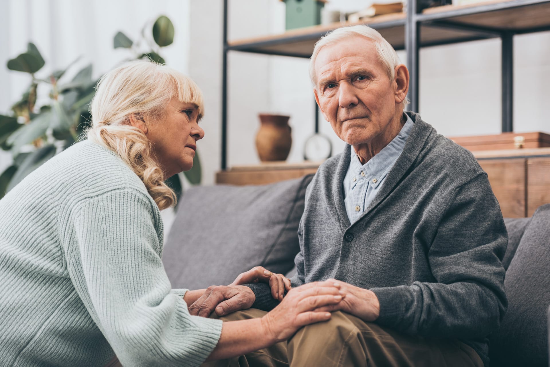 Senior in depression, comforted by family